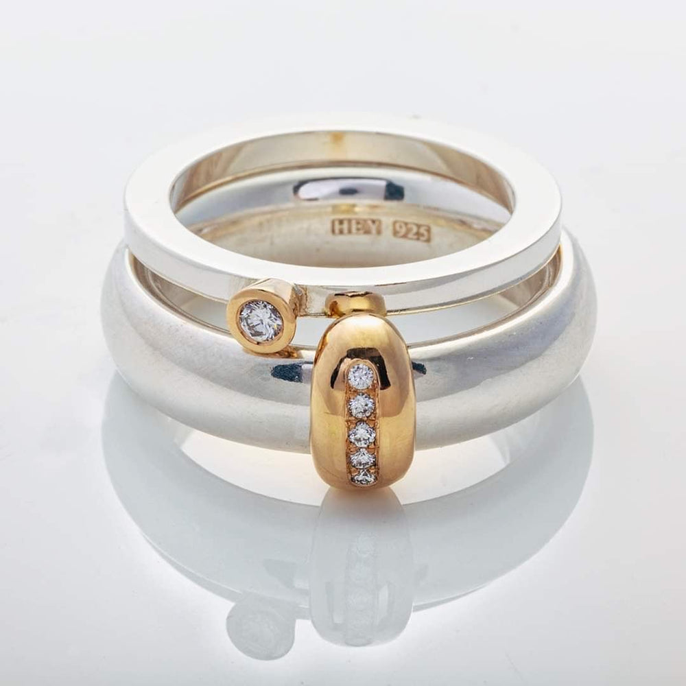 Långrund ring i silver och guld matchad med Regnbågen med vit diamant – Ett Rum För Smycken